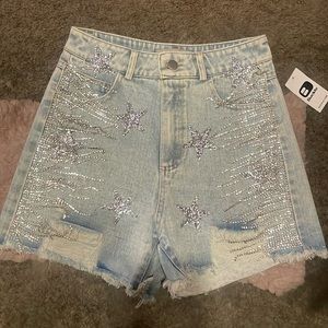 Jean shorts with sparkly star embellishments & crystal fridge on the side. NEW